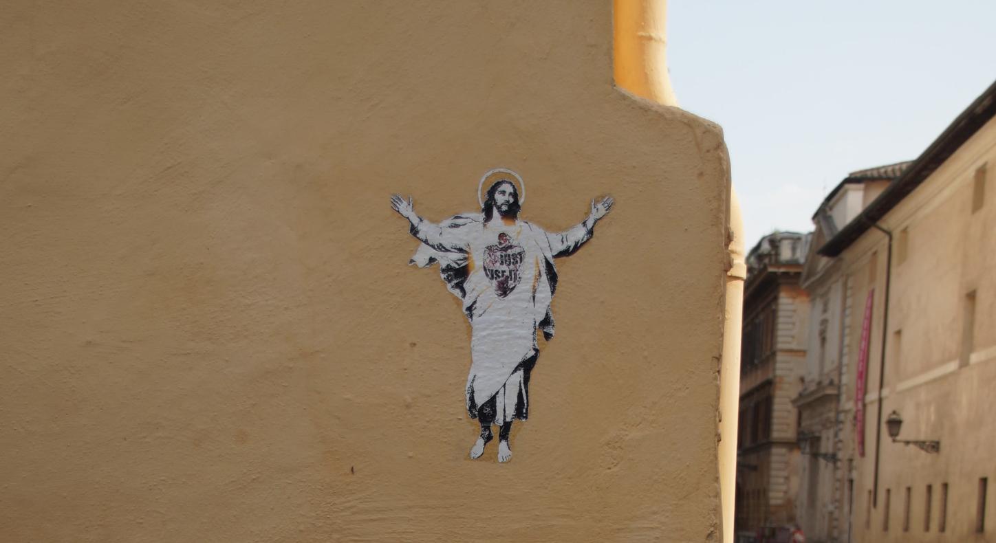 Zu sehen ist ein Jesus, der von einem Graffitikünstler auf eine Wand gesprüht wurde