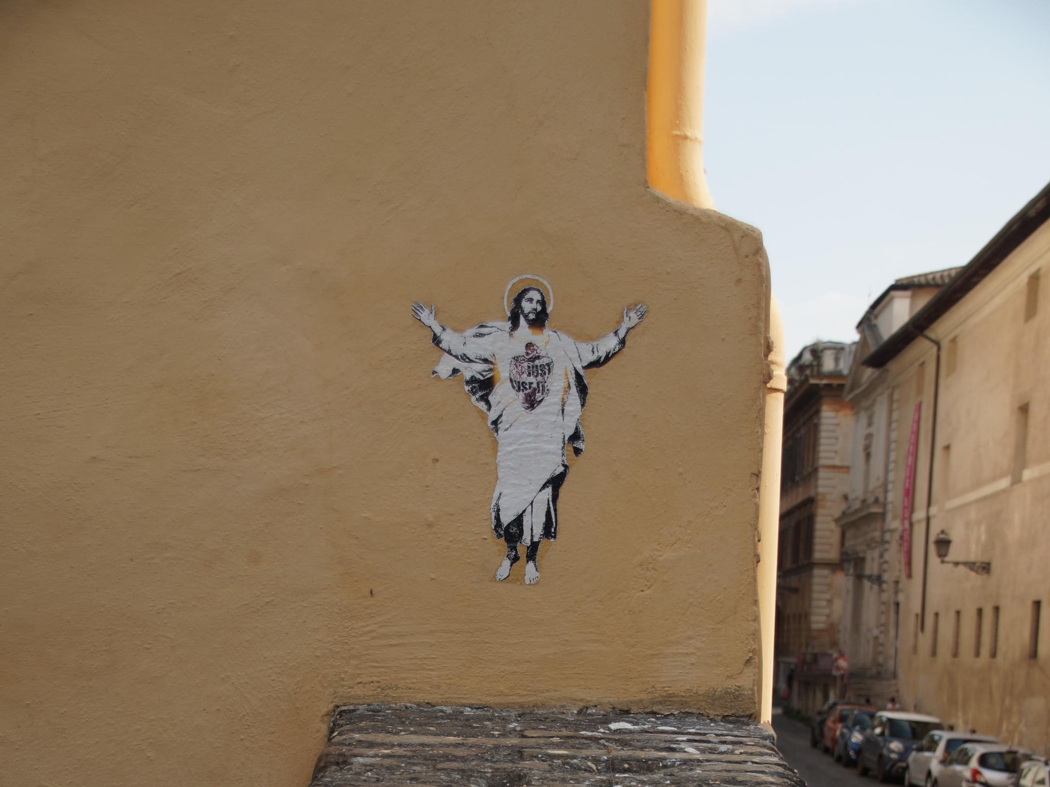 Zu sehen ist ein Jesus, der von einem Graffitikünstler auf eine Wand gesprüht wurde