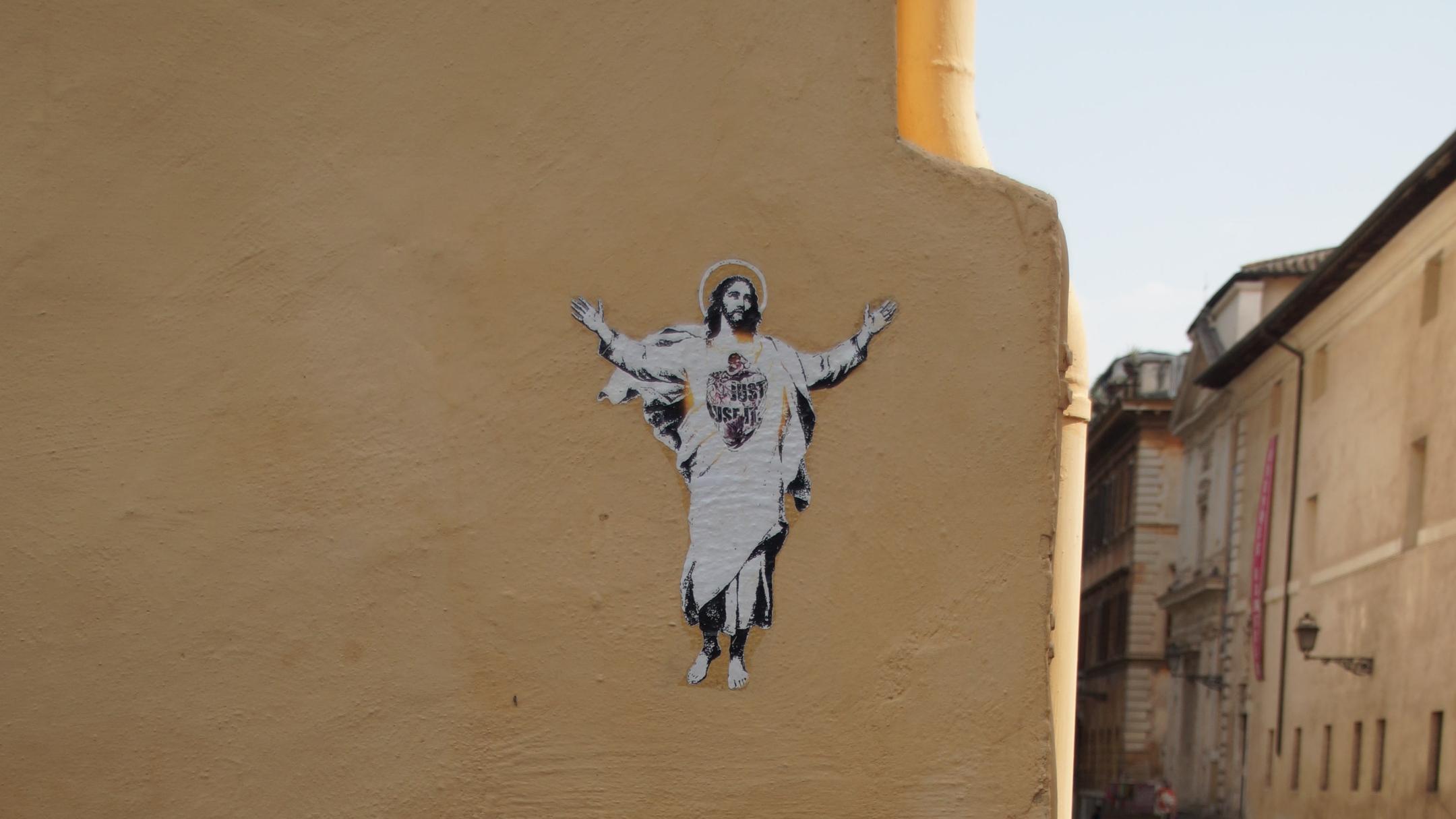 Zu sehen ist ein Jesus, der von einem Graffitikünstler auf eine Wand gesprüht wurde