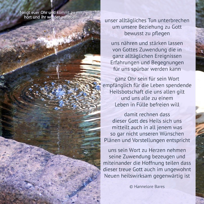 Nahansicht eines Sandsteinbrunnens