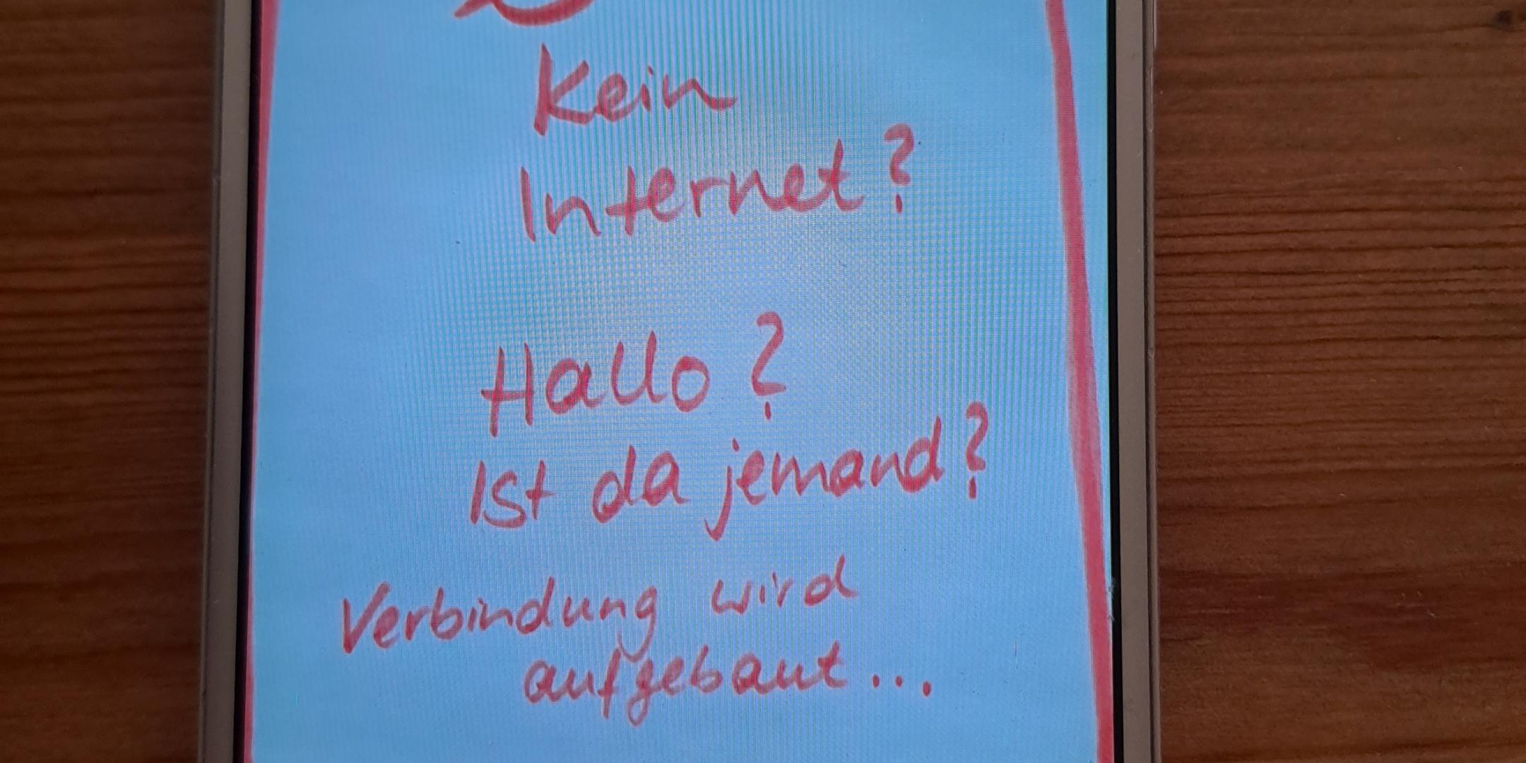 Das BIld zeigt ein Smartphone. Auf dem Smartphone ist folgender Text zu lesen: Kein Internet? Hallo? Ist da jemand? Verbindung wird aufgebaut...