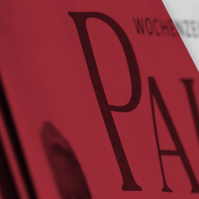 Man sieht ein Banner mit einem roten Hintergrund und mit Zeitungen. Darüber steht 'Weitere Nachrichten gibt es im gemeinsamen Newsportal von Paulinus und Bistum Trier.