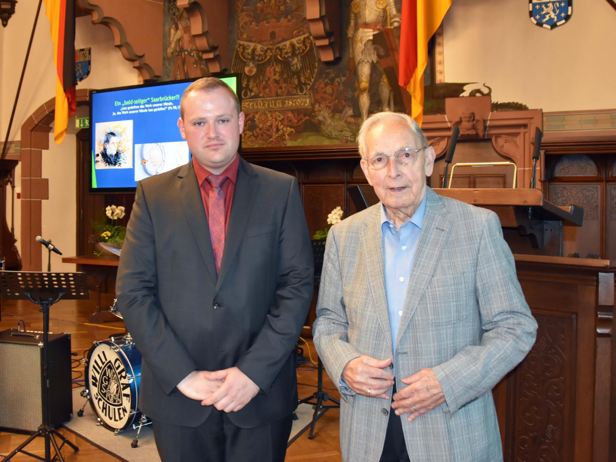 Referent Dr. Frederik Simon und Joachim Baez, der Neffe Willi Grafs.