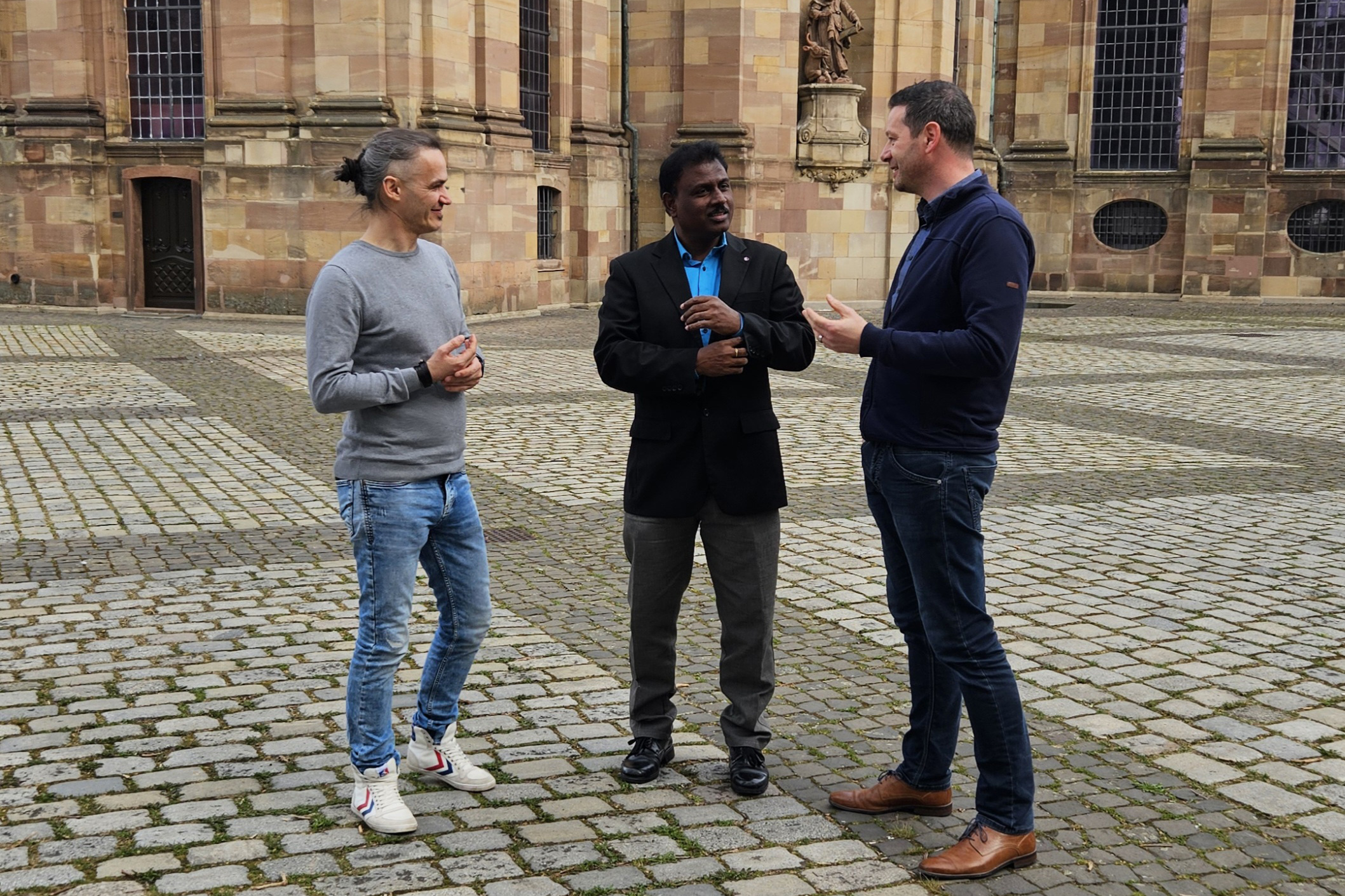 Tomasz Welke, Gast Jebamalai Pitchai Sagayaraj und Dr. Thorsten Hoffmann (vlnr.)