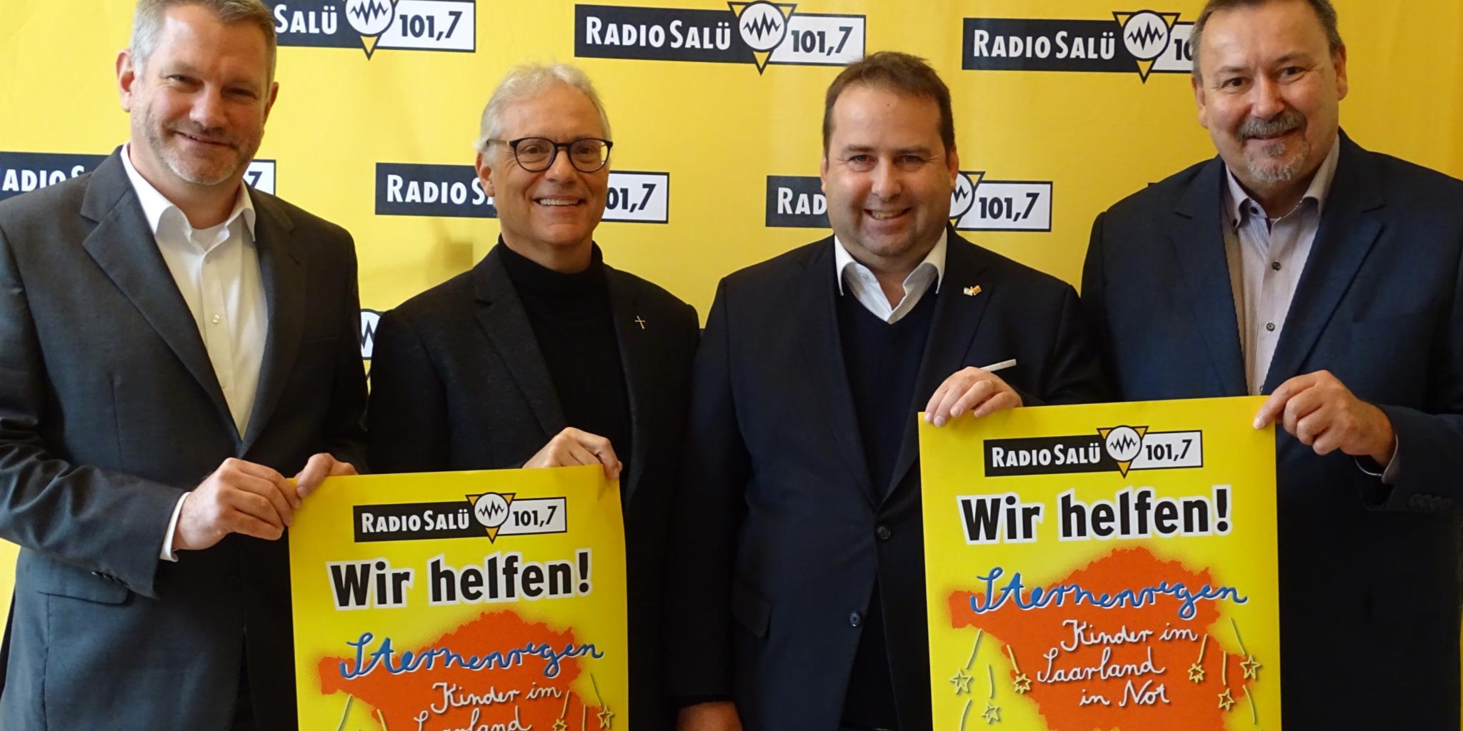 v.l.n.r. Caritasdirektor Michael Schley, Pfarrer Wolfgang Glitt, Sozialminister Dr. Magnus Jung, Radio-Salü-Geschäftsführer Axel Musolff