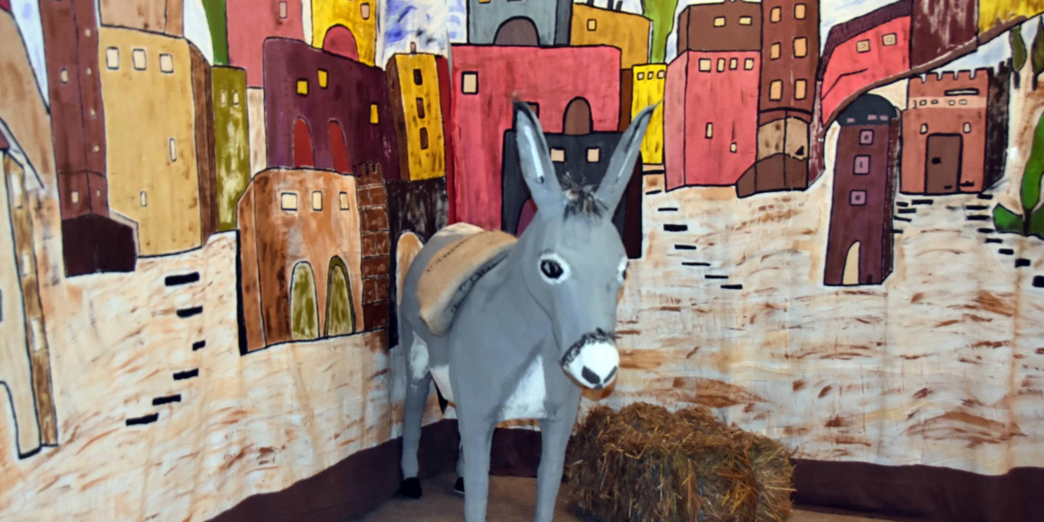 Auf einem Esel zieht Jesus in Jerusalem ein