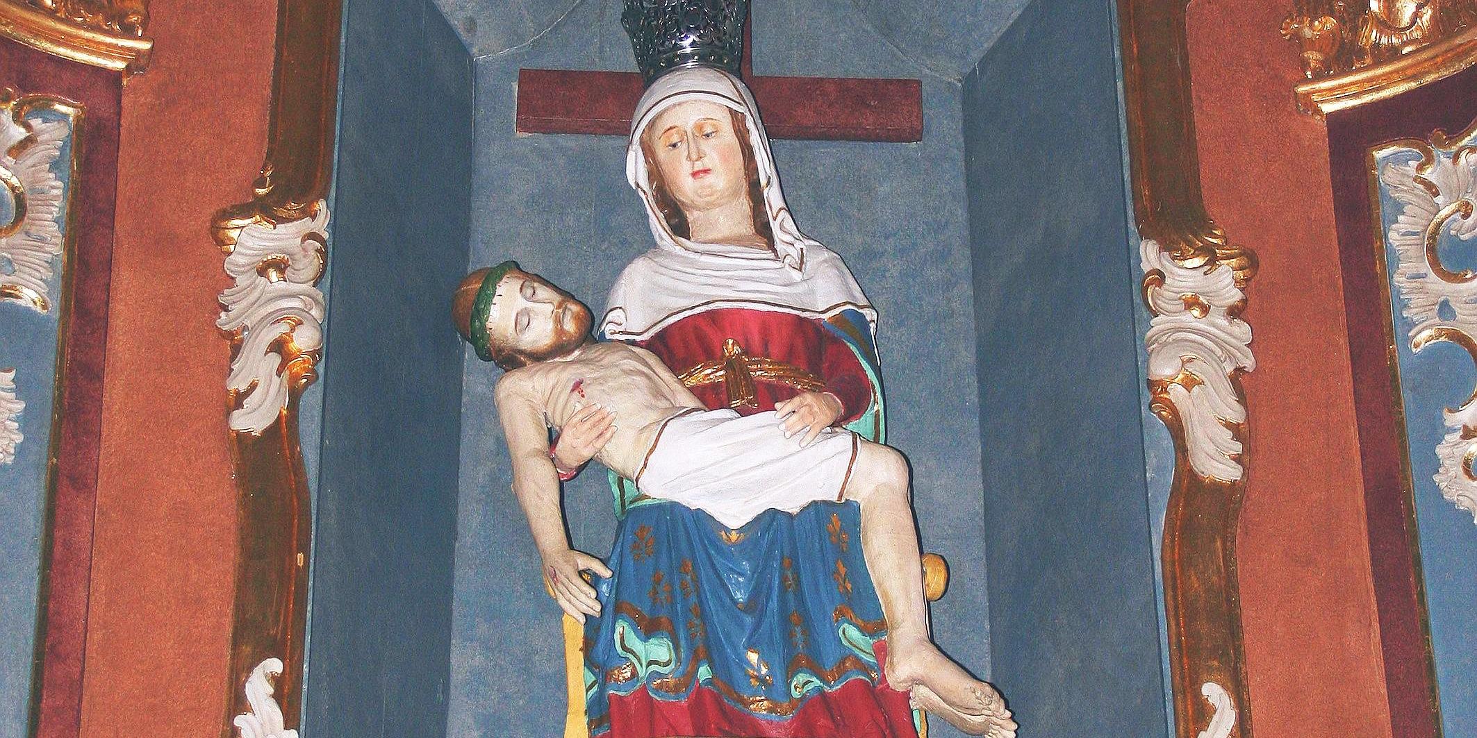 Seit vielen Jahrhunderten wird im Eifelort Weidingen ein spätgotisches Gnadenbild der trauernden Gottesmutter verehrt, die auf ihrem Schoß den toten Jesus trägt.